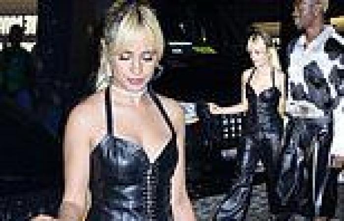 Camila Cabello sets pulses racing in a leather flared jumpsuit as she joins Lil ... trends now