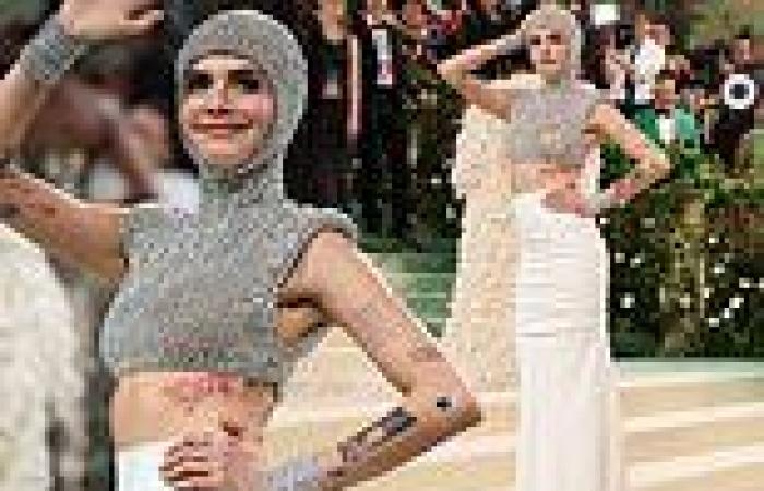 2024 Met Gala: Cara Delevingne flashes her abs in a quirky hooded garment ... trends now