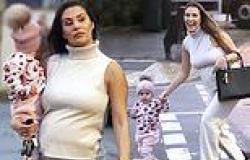 Chloe Goodman shows off her baby bump in cream sweater during adorable walk ...