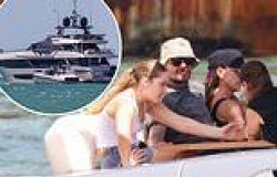 David and Victoria Beckham cosy up on a charter boat as they join their brood ... trends now