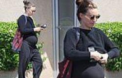 Pregnant Rooney Mara dresses her baby bump in head-to-toe black as she steps ... trends now
