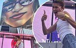 Zendaya gives two thumbs up while striking poses in front of giant billboard ... trends now