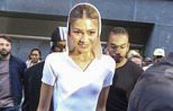 Zendaya shows off her figure in a clinging white gown with a statement hood in ... trends now