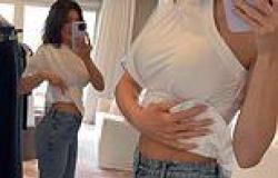 Kylie Jenner proves she does NOT have a baby bump in new video that flaunts her ... trends now