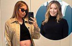 Ashley Tisdale displays her baby bump in a crop top and 'the only jeans that ... trends now
