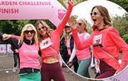 Trinny Woodall flashes her abs in a pink top as she throws her arms in the air ... trends now