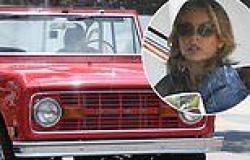 Sydney Sweeney cruises in cherry red 1969 Ford Bronco to lunch at Beverly Hills ... trends now