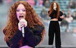 Jess Glynne showcases her figure in black crop top as she performs at The ... trends now