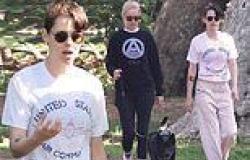Kristen Stewart flashes her trim tummy in a white crop top as she and fiancée ... trends now