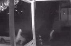 Shocking moment two suspected arsonists are seen running from home before it ... trends now