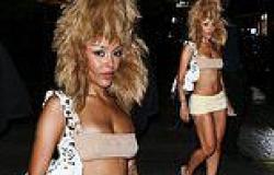 Doja Cat turns heads in VERY short skirt and bandeau top while heading to ... trends now