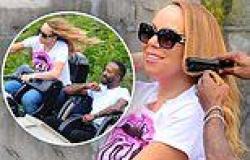 Mariah Carey gets her hair touched up on a ROLLERCOASTER as stylist brushes ... trends now