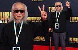 Iconic activist Danny Lim flashes the peace sign at the Australian premiere of ... trends now