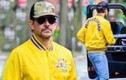 Bradley Cooper wears a bright yellow bomber jacket that says Muhammad Ali 1974 ... trends now