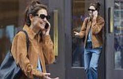Katie Holmes looks effortlessly stylish in a suede jacket and light-wash jeans ... trends now