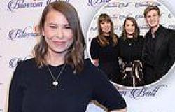 Bindi Irwin dazzles in a chic black and brown skirt as she receives top honour ... trends now