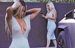 Kim Kardashian shows off her curves in plunging dress as she steps out of her ... trends now