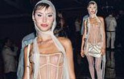 Iris Law catches the eye in a semi-sheer corset bustier and mini satin skirt as ... trends now