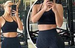 Kim Kardashian teases her toned tummy in black spandex workout gear just days ... trends now