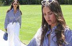 Jessica Alba cuts a fashionable figure in a striped blouse and bright white ... trends now