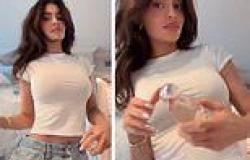 Kylie Jenner shows off her toned abs in cropped T-shirt and low-rise jeans ... trends now