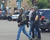 Officer 'down' after shooter opens fire in Denver suburb: Injured cop is rushed ...
