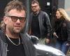 Damon Albarn continues to sport his mullet hair do as he heads for breakfast in ...