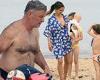 Alec Baldwin goes shirtless as he carries his children's toys during family ...