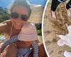 Beach babes! Jennifer Hawkins and daughter Frankie, one, enjoy a day at the ...