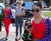 Vanessa Hudgens makes a splash in cherry red workout gear while out with gal ...
