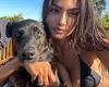Victoria's Secret model Kelly Gale shows off her ample cleavage in a string ...