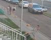 Two Russian boys try to impress girls by attacking a trash can which 'fights ...