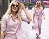 Ashley Roberts looks effortlessly chic in a pale pink co-ord and trainers