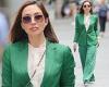 Myleene Klass turns heads in a bright green suit teamed with pointed white boots