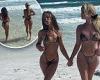 Kim Zolciak and her daughter Ariana Biermann put on a cheeky display as they ...