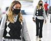 Keeley Hazell looks stylish as she jets back to London from New York