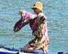Katy Perry pays homage to THAT famous naked paddleboarding snap of fiancé ...