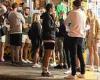 Bondi locals enjoy a night out on the streets buying takeaway beers and ...