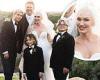 Gwen Stefani and new husband Blake Shelton pose with her suited-up sons at ...