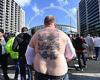 Three Lions fan who showed off his tattoos on Wembley Way becomes a social ...