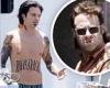 Sebastian Stan shows off his 'tattooed' torso on the set of Pam & Tommy