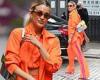 Ashley Roberts commands attention in a bright orange co-ord as she arrives at ...