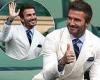 David Beckham waves and gives a thumbs up to fans at Wimbledon men's semi-final 