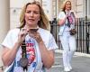 Michelle Mone shows off her trim figure in white skinny jeans as she chats on ...