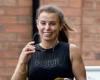 Beaming Coleen Rooney jogs out of the gym in tight workout gear