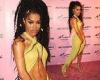 Teyana Taylor flaunts her washboard abs in a racy cut-out dress at a ...