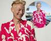 Tilda Swinton displays her bold sense of style in a pink camouflage suit at ...