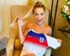 Rita Ora covers her modesty with just an England shirt