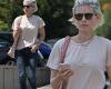 Kate Mara pairs her platinum blonde locks with blue jeans and a t-shirt for ...