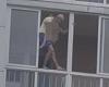 Russian father holds three-year-old son on window ledge for hours and threatens ...